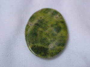 Atlantisite Thumb Stone